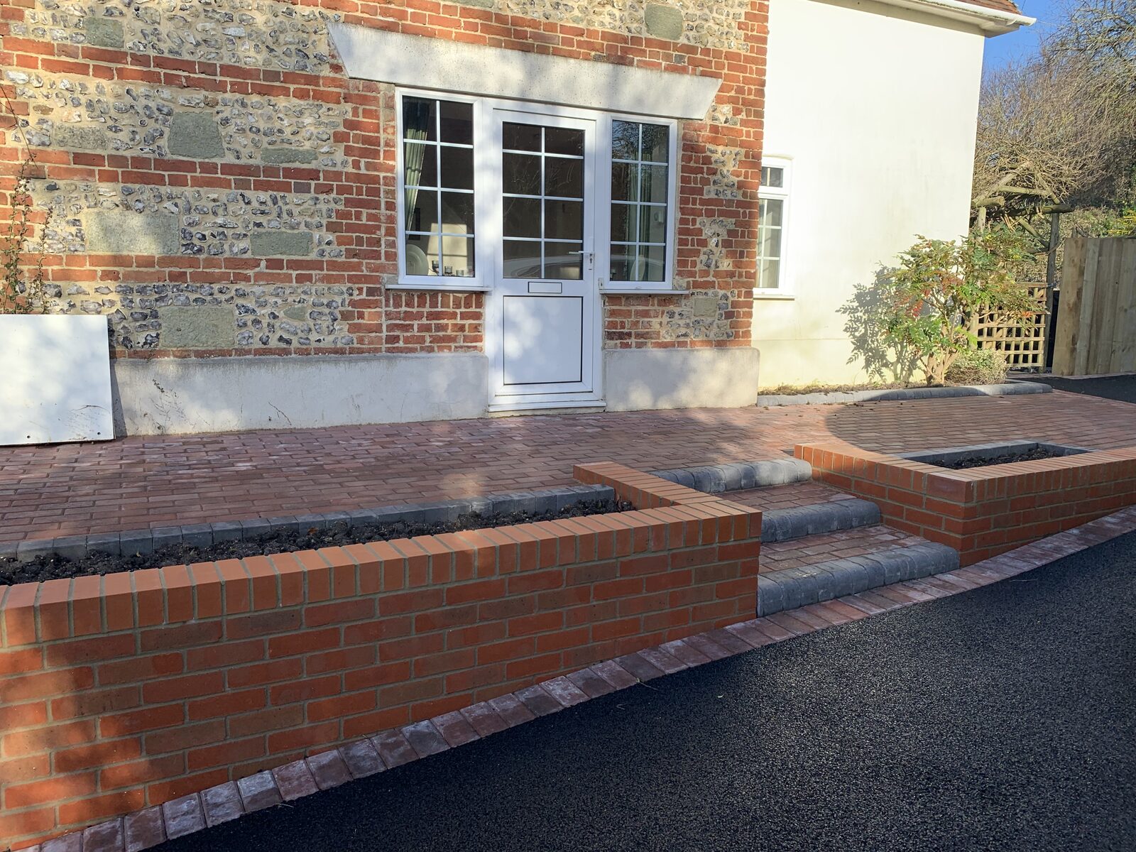 Close-up detail of a structural garden wall by White & Sons